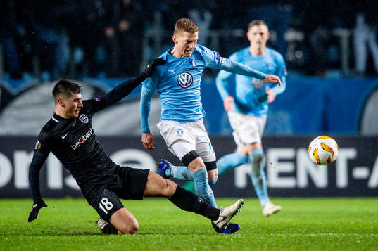 Ruslan Malinovskyi of Genk and Anders Christiansen of