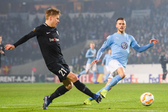 Jere Uronen of Genk and Arnór Ingvi Traustason of Malmö FF