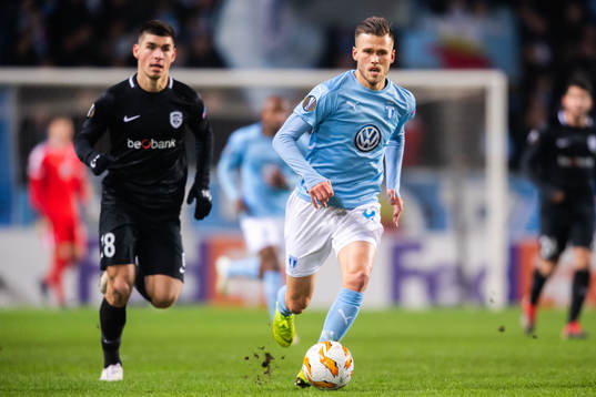 Arnór Ingvi Traustason of Malmö FF and Ruslan Malinovskyi