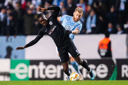 Mbwana Samatta of Genk and Rasmus Bengtsson of Malmö FF