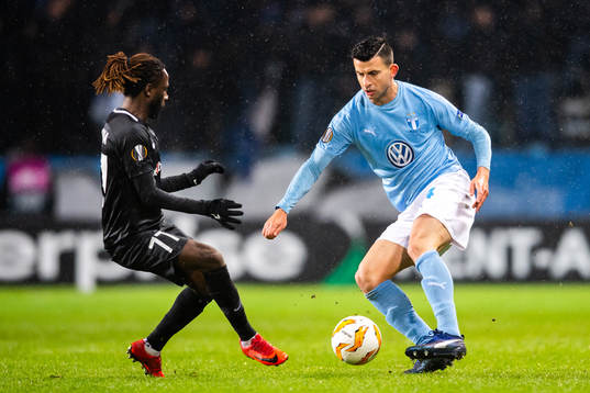 Behrang Safari of Malmö FF and Dieumerci Ndongala of Genk