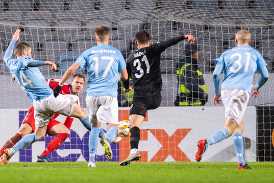 Lasse Nielsen of Malmö FF and Joakim Maehle of Genk