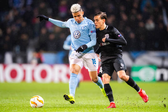 Romain Gall of Malmö FF and Leandro Trossard of Genk