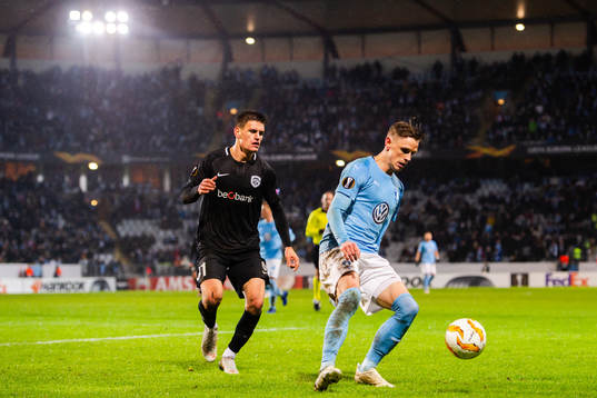 Joakim Maehle of Genk and Sören Rieks of Malmö FF