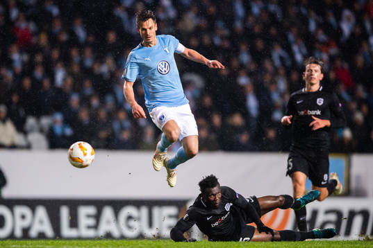 Markus Rosenberg of Malmö FF and Joseph Aidoo of Genk