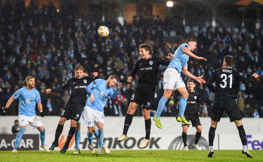Marcus Antonsson of Malmö FF in action with Sander Berge