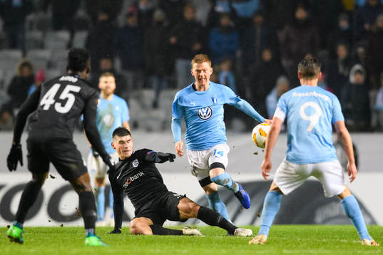 Anders Christiansen of Malmö FF and Joakim Maehle of Genk