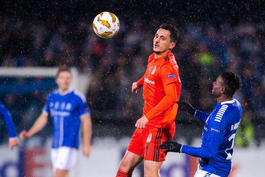 Mustafa Pektemek of Besiktas and Rashad Muhammed of