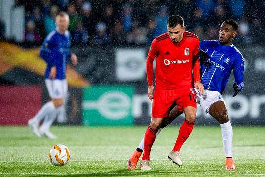 Oguzhan Ozyakup of Besiktas and Rashad Muhammed of
