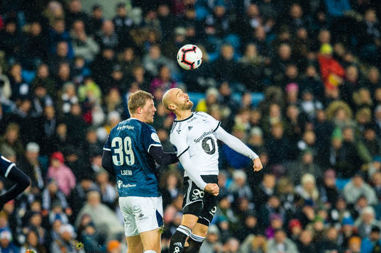 Lars Sætra of Strømsgodset and Tore Reginiussen of