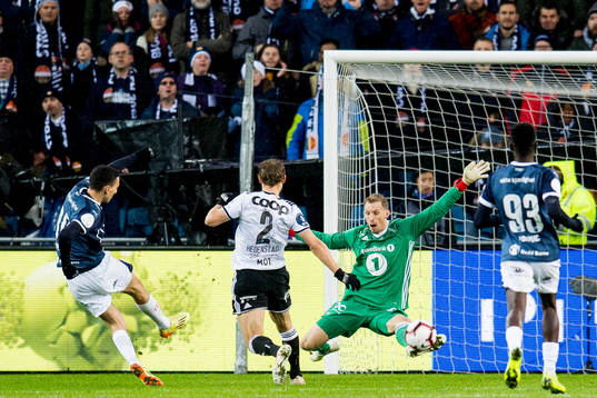 Goalkeeper André Hansen of Rosenborg saves the attempt