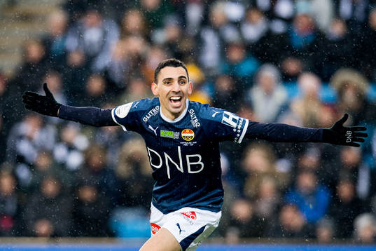 Mustafa "Mos" Abdellaoue of Strømsgodset celebrates
