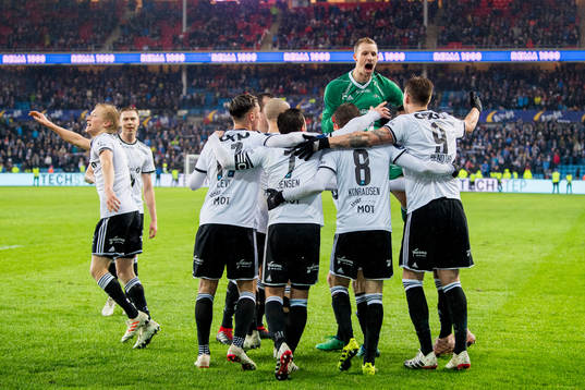 Nicklas Bendtner of Rosenborg celebrates with teammate and