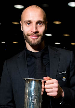Tore Reginiussen of Rosenborg poses with the trophy