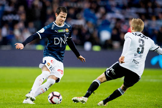Lars Vilsvik of Strømsgodset and Birger Meling of Rosenborg