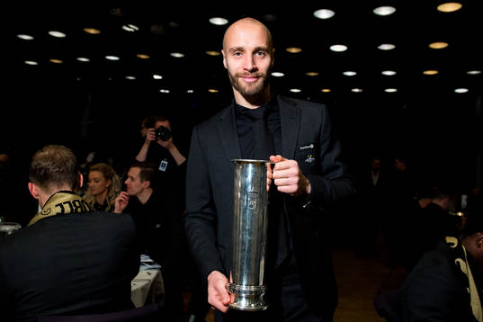 Tore Reginiussen of Rosenborg poses with the trophy