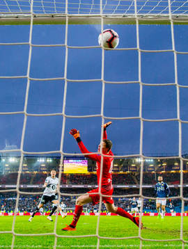 Nicklas Bendtner of Rosenborg scores 4-1 behind goalkeeper