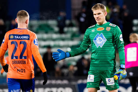 Adam Örn Arnarson and goalkeeper Andreas Lie of Aalesund