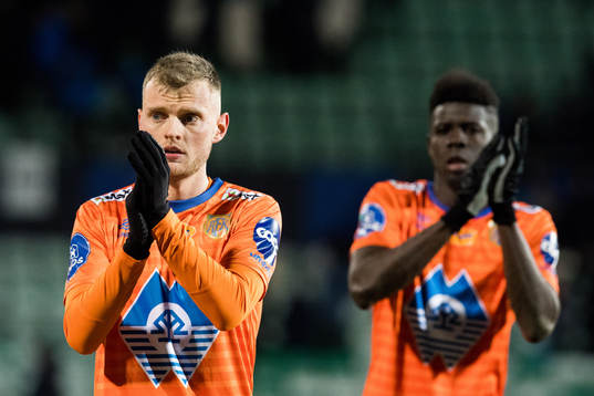 Adam Örn Arnarson and Pape Habib Gueye of Aalesund