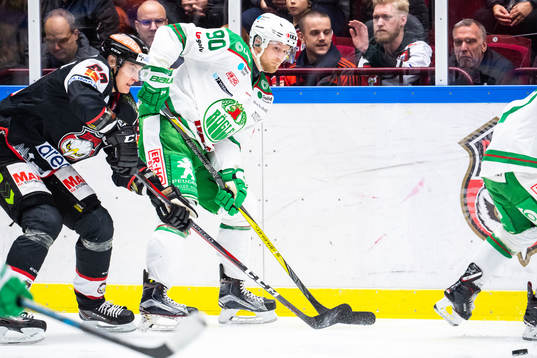 Rögles Ted Brithén och Malmö Redhawks Fredrik Händemark