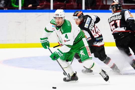Rögles Kodie Curran och Malmö Redhawks Carl Persson