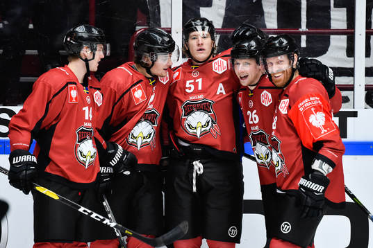 Emil Sylvegård (middle) scored 1-0  and celebrates with