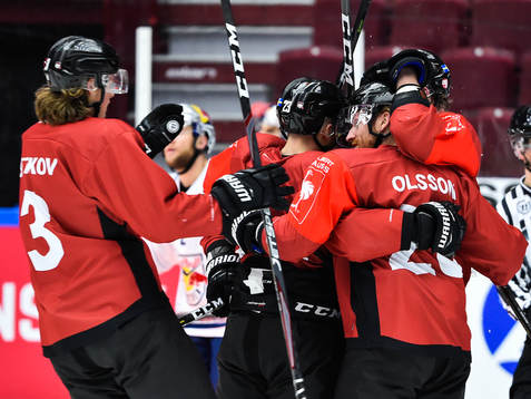 Jens Olsson (far right) celebrates with team mates