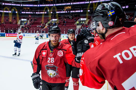 Jens Olsson of Malmö Redhawks celebrates 4-3