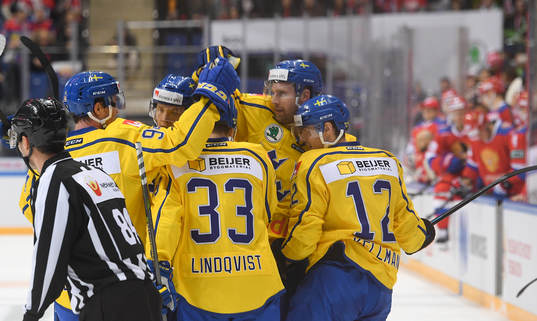 Sweden's players celebrate 2nd team's goal