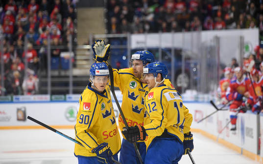 Sweden's players celebrate 2nd team's goal