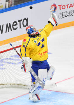 Sweden's goalie Lars Johansson catches a puck
