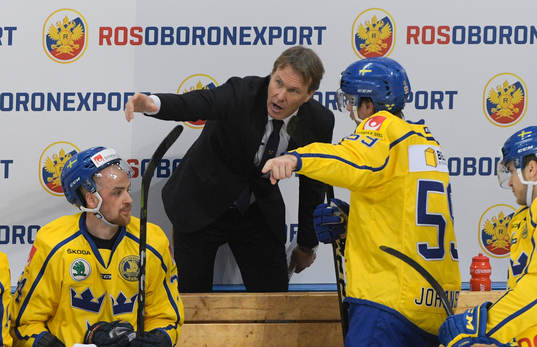 Sweden's coach Johan Garpenlov talks to Linus Johansson