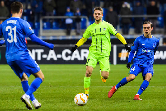 Joakim Maehle and Leandro Trossard of Genk and Ole Jørgen