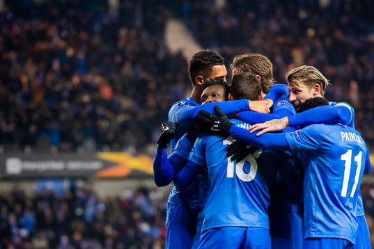 Joseph Aidoo of Genk celebrates with his teammates