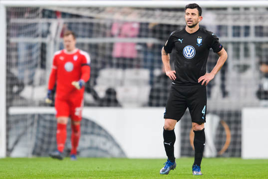 Behrang Safari of Malmö FF looks dejected
