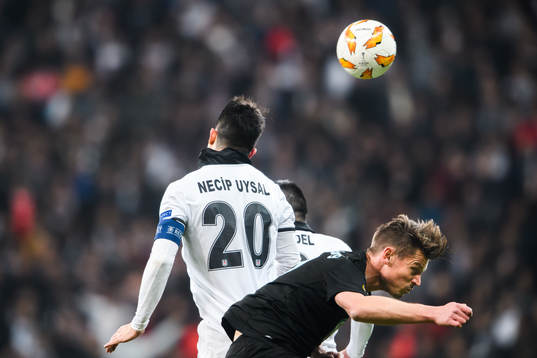 Necip Uysal of Besiktas and Markus Rosenberg of Malmö FF