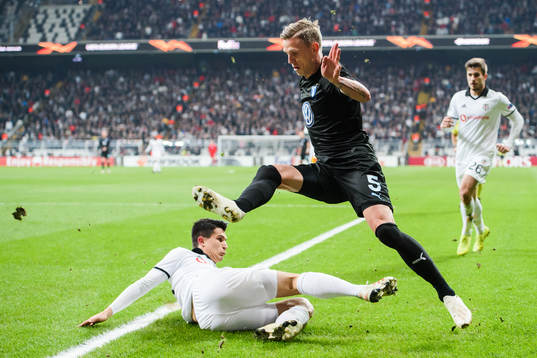 Sören Rieks of Malmö FF and Necip Uysal of Besiktas