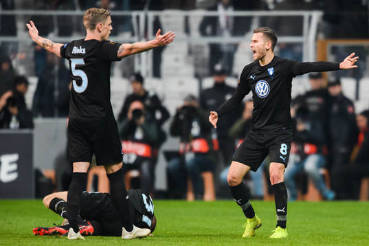 Arnór Ingvi Traustason and Sören Rieks of Malmö FF reacts