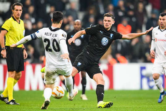 Marcus Antonsson of Malmö FF and Necip Uysal of Besiktas