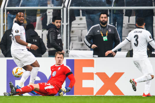 Cyle Larin and Adriano Correia of Besiktas and goalkeeper