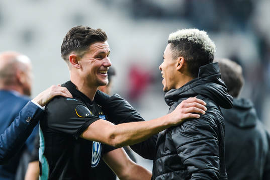 Marcus Antonsson celebrates with Romain Gall of Malmö FF