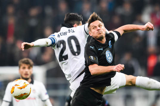 Markus Rosenberg of Malmö FF and Necip Uysal of Besiktas