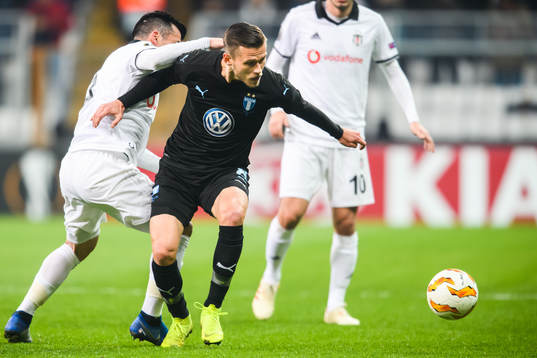 Arnór Ingvi Traustason of Malmö FF and Necip Uysal of