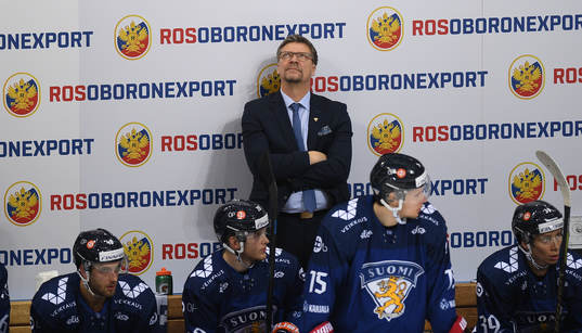 Finland's head coach Jukka Jalonen looks at a scoreboard