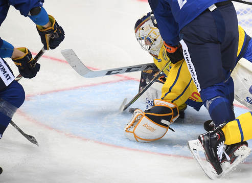 Sweden's goalie Adam Reideborn makes a save