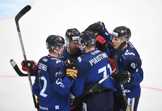 Finland's players celebrate the team's second goal