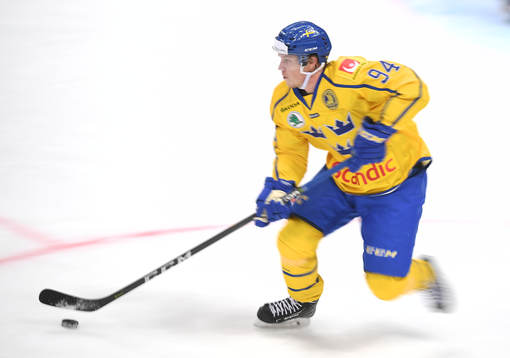 Sweden's Joel Persson controls a puck