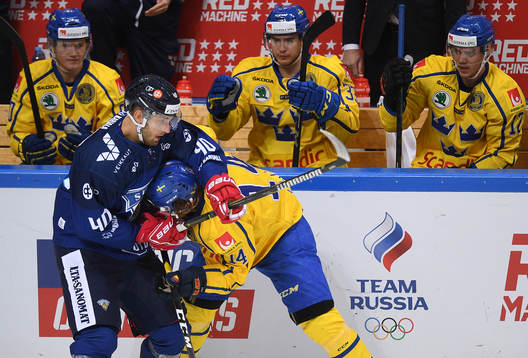Finland's Petteri Lindbohm, left, holds Sweden's Jakob Lilja
