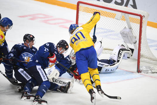 Finland's goalie Rasmus Tirronen makes a save