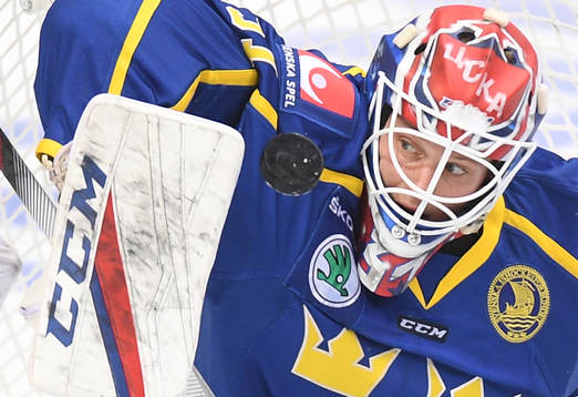 Sweden's goalie Lars Johansson makes a save